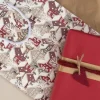 Lahjakassi Joulutalot 24 cm