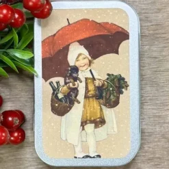 Piparminttupastillit Tyttö lumisateessa