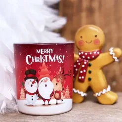 Tuoksukynttilä lasiastiassa Merry Christmas